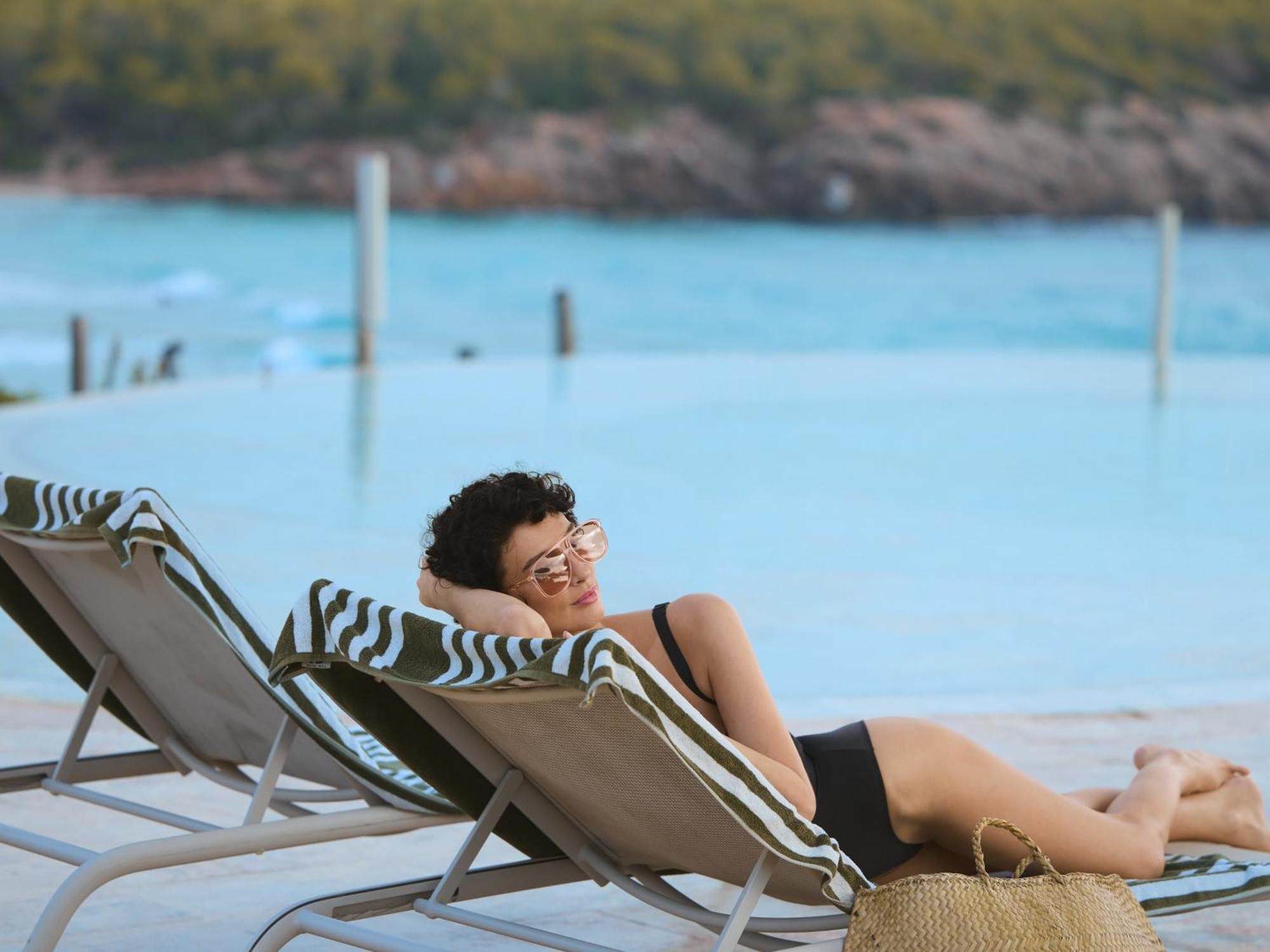 Bless Hotel Ibiza - The Leading Hotels Of The World Es Cana Εξωτερικό φωτογραφία A woman sunbathing